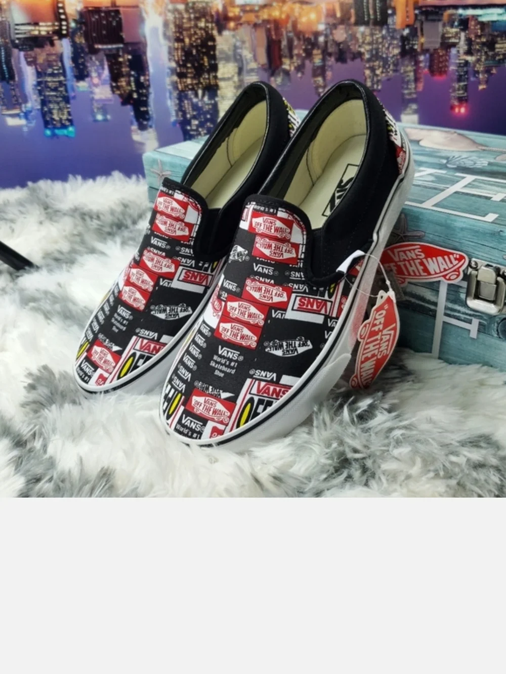Vans Black Slip-On Sneakers with Red, White & Yellow Logo Print